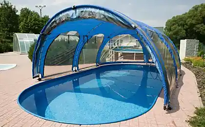 Heated outdoor pool with solar collectors