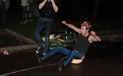 Riding in a basin that is attached to the machine